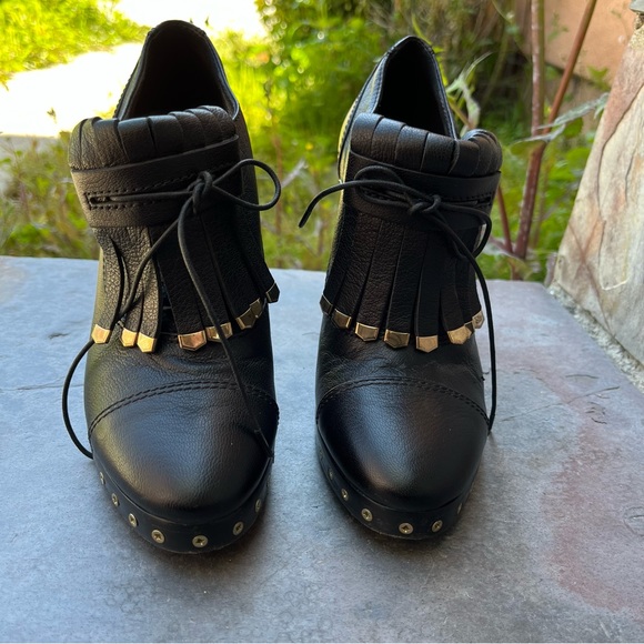 Designer Lanvin black Oxford heels with gold detailing. - Picture 1 of 10